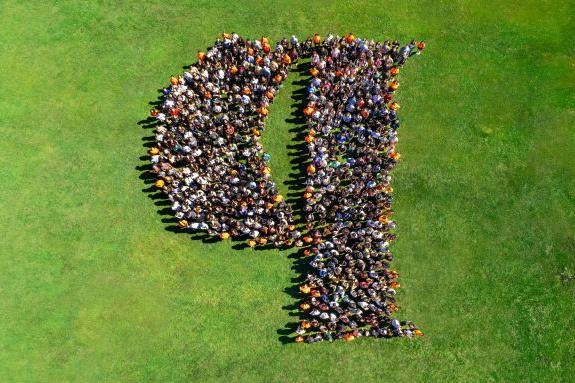 Students form the Pacific "P" shape.